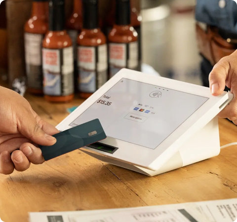 Clover POS system in use at restaurant - all-in-one payment processing solution for businesses